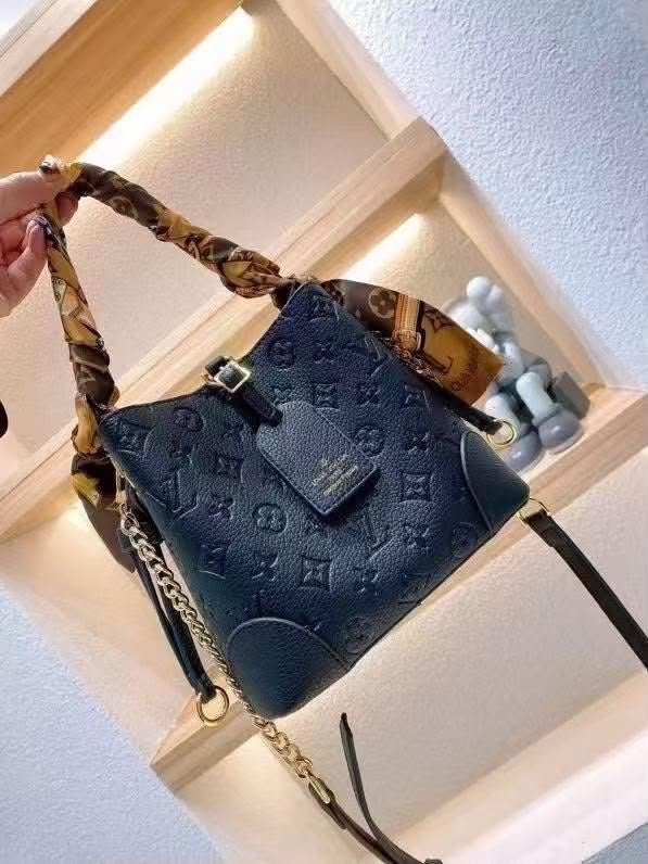 Louis Vuitton Black Embossed Monogram Bucket Bag